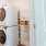 a laudry area with shelving